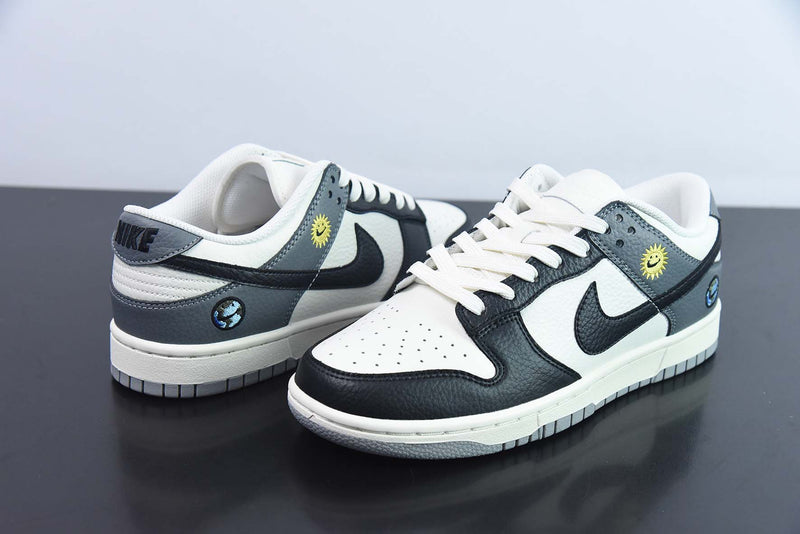 Tênis Dunk Low – Modelo “World Smile” (Branco/Amarelo/Preto) – Estampa Smiley
